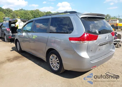 2011 Toyota Sienna Xle V6 z USA, uszkodzony, nr VIN 5TDYK3DCXBS144495
